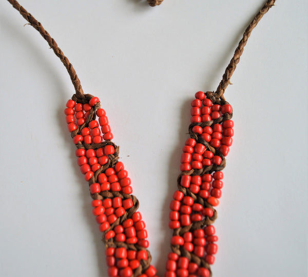 Leather necklace with red beads