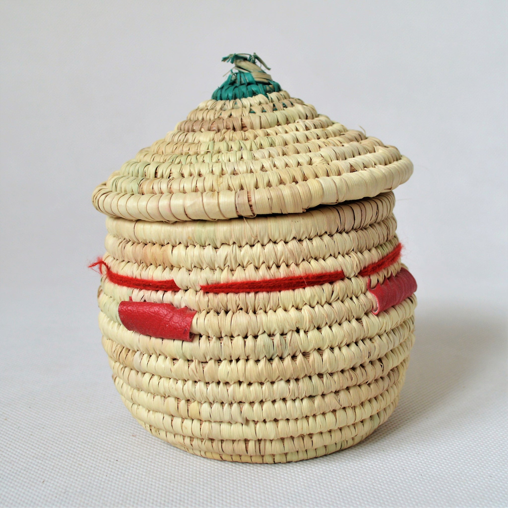 Woven African basket with a fitted lid