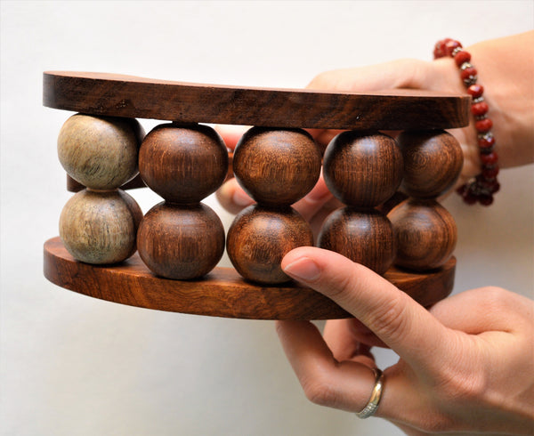 Wooden massage tool with 10 rolling balls