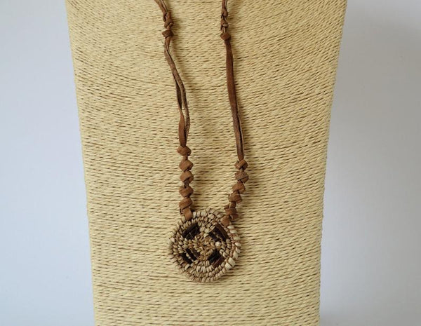 African necklace from natural leather and palm straw