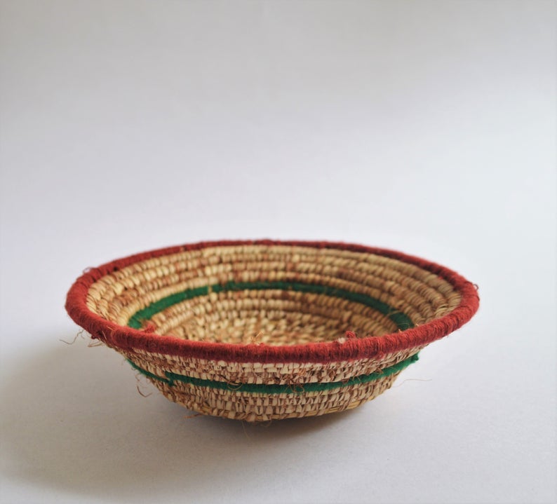 Tribal woven wall plates with wool decoration